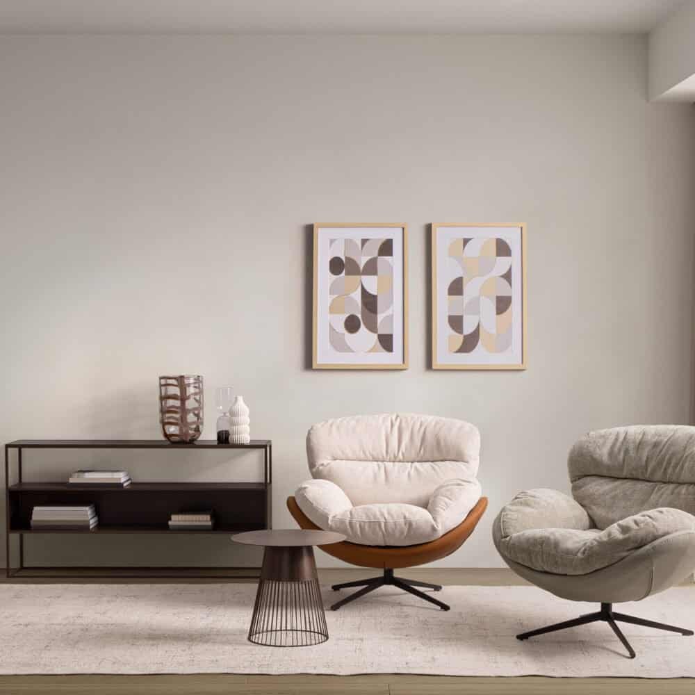 Spazio living elegante con sedute comode e arredi di design | Ambiente domestico raffinato e accogliente.