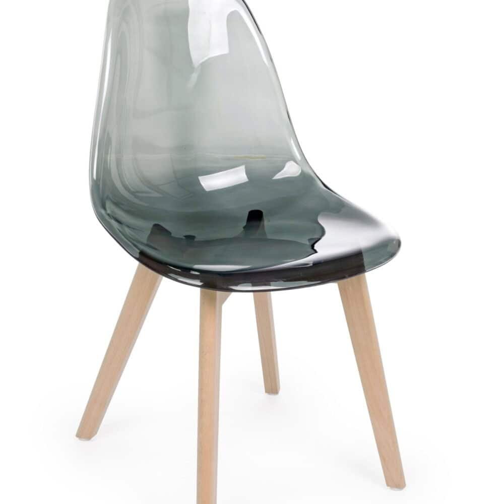 Sedia design trasparente con gambe in legno, ideale per arredamento contemporaneo.