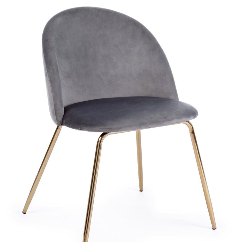 Sedia in velluto grigio con gambe in metallo dorato, perfetta per decorare con stile.