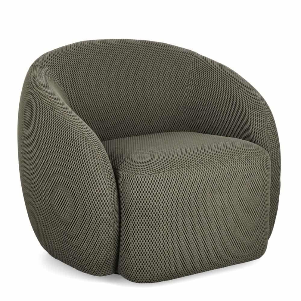 Poltrona moderna design in tessuto trapuntato, ideale per arredo interni di lusso e comfort.