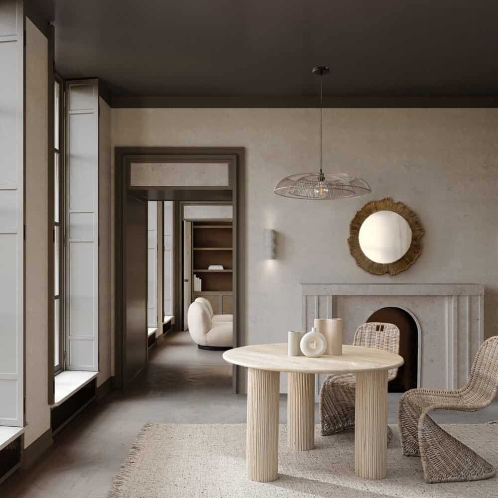 Soggiorno decorato in stile naturale con mobili in rattan e dettagli di design moderno.