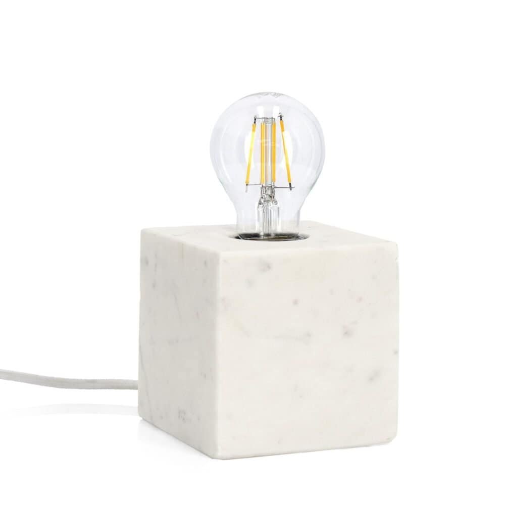 Lampada in marmo con lampadina a filamento LED, design elegante e illuminazione di tendenza.