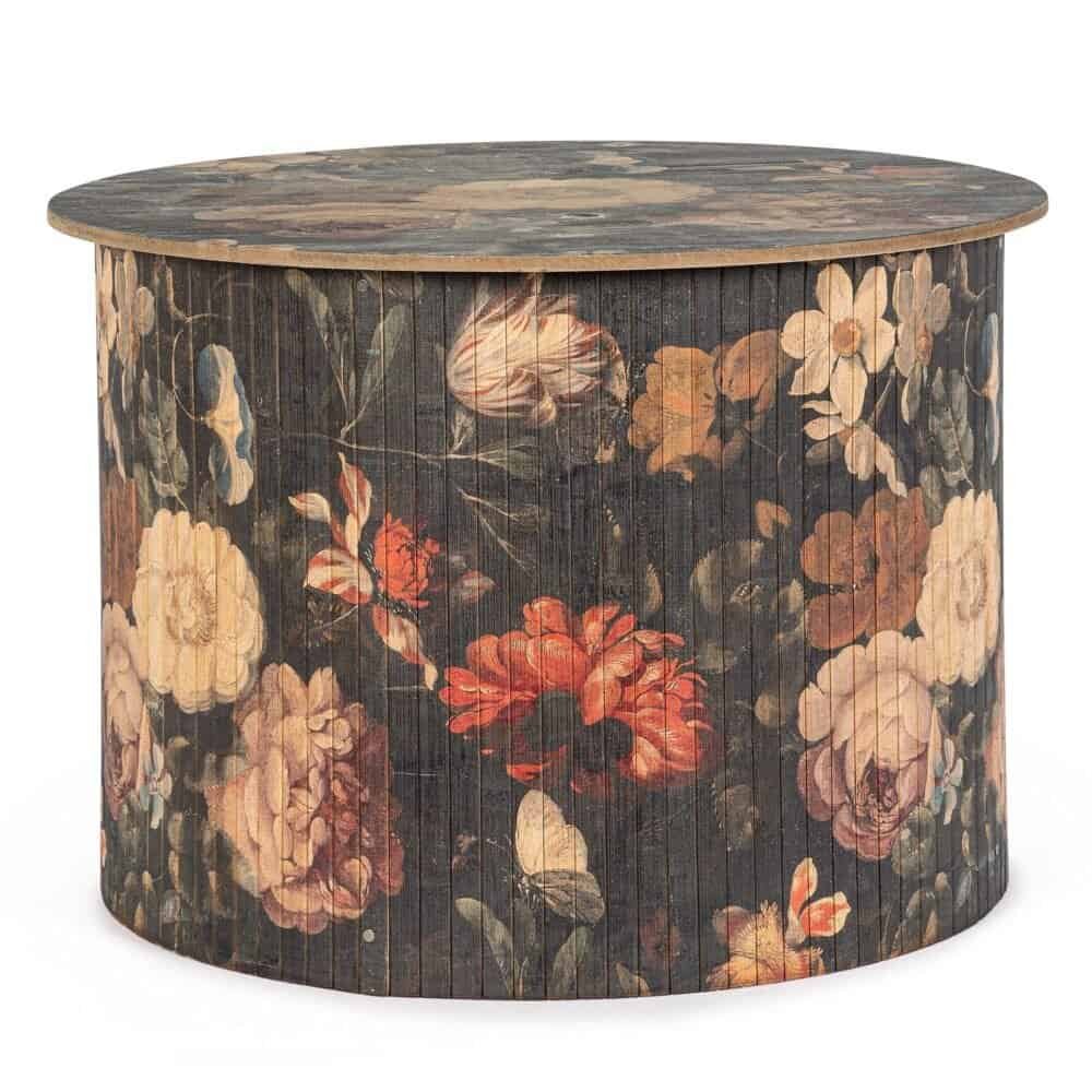 Tavolo rotondo in legno con motivo floreale vintage, ideale per interni eleganti.