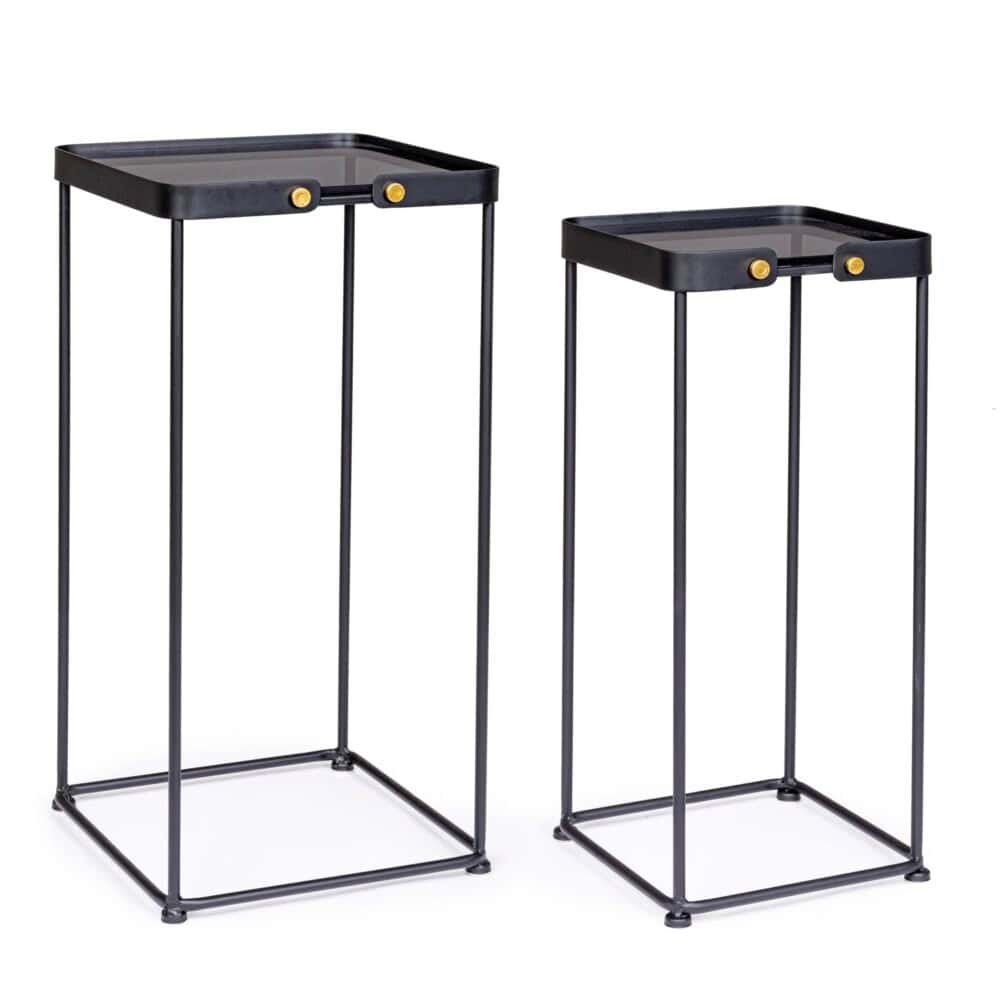 Immagine di eleganti vasi da fiori neri con dettagli dorati, ideali per arredi raffinati e moderni.