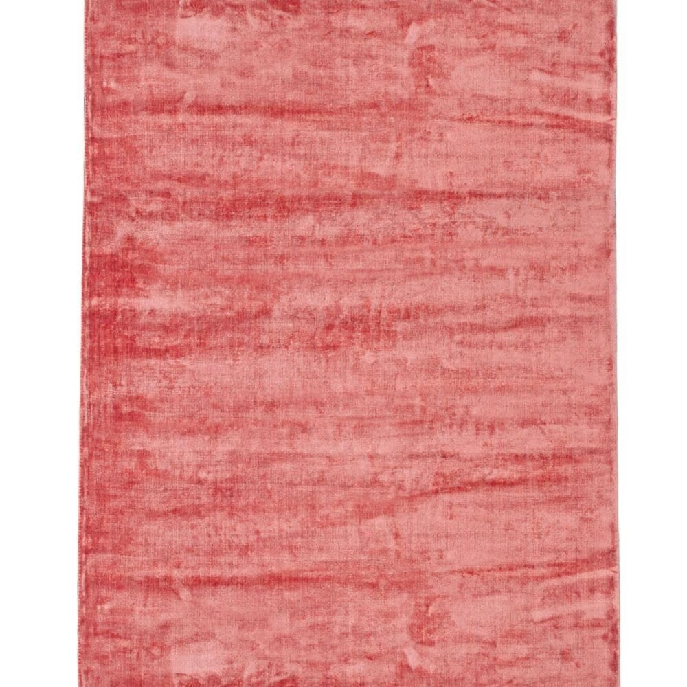 Tappeto elegante in tonalità rosa, perfetto per arricchire ogni ambiente.