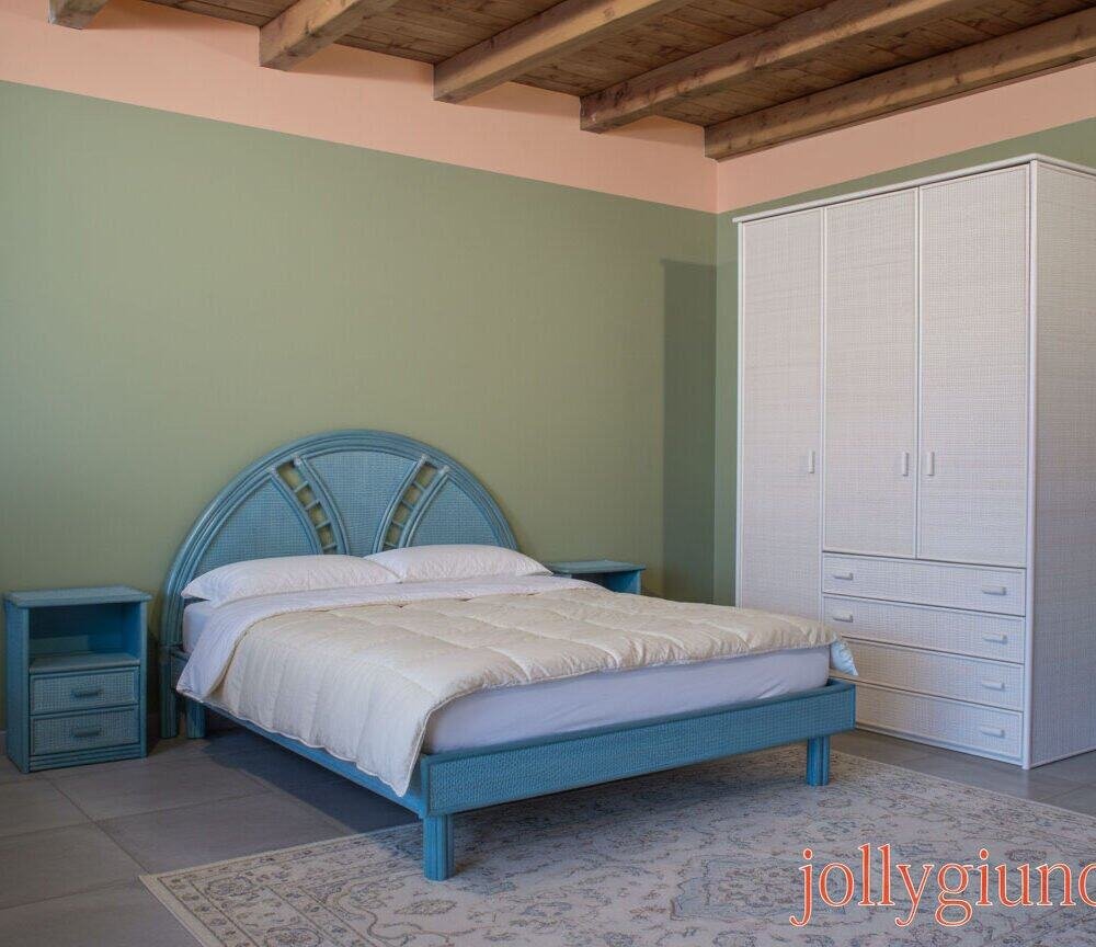 Camere da letto in stile rilassante con arredi in fibra di vetro celeste, atmosfera accogliente e design moderno.