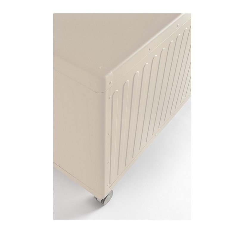 BAULE PCUSC C-RUOTE OCEAN SETA S4 - JOLLYGIUNCO Beige rolling cabinet with vertical slotted panels and small wheels on a white floor