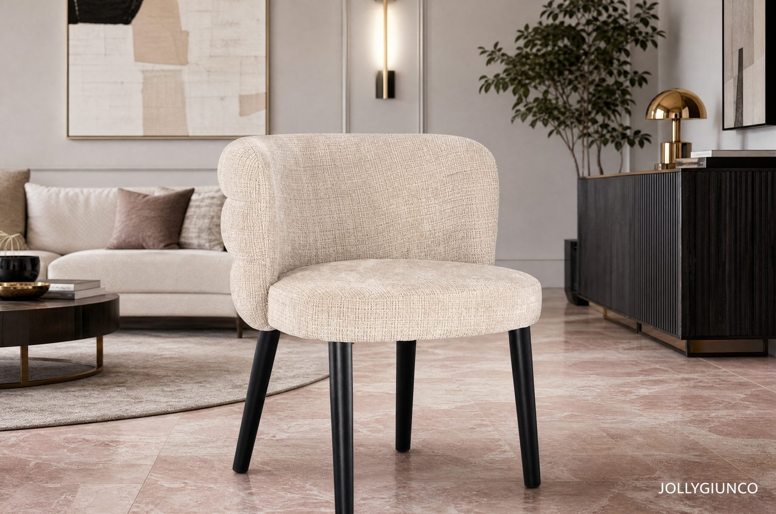 SEDIA C-BR ILMA LUCENTE-ARDESIA10 - JOLLYGIUNCO Beige upholstered chair with black legs in a modern living room, with a cream sofa, abstract wall art, and a gold lamp on a dark cabinet in the background.