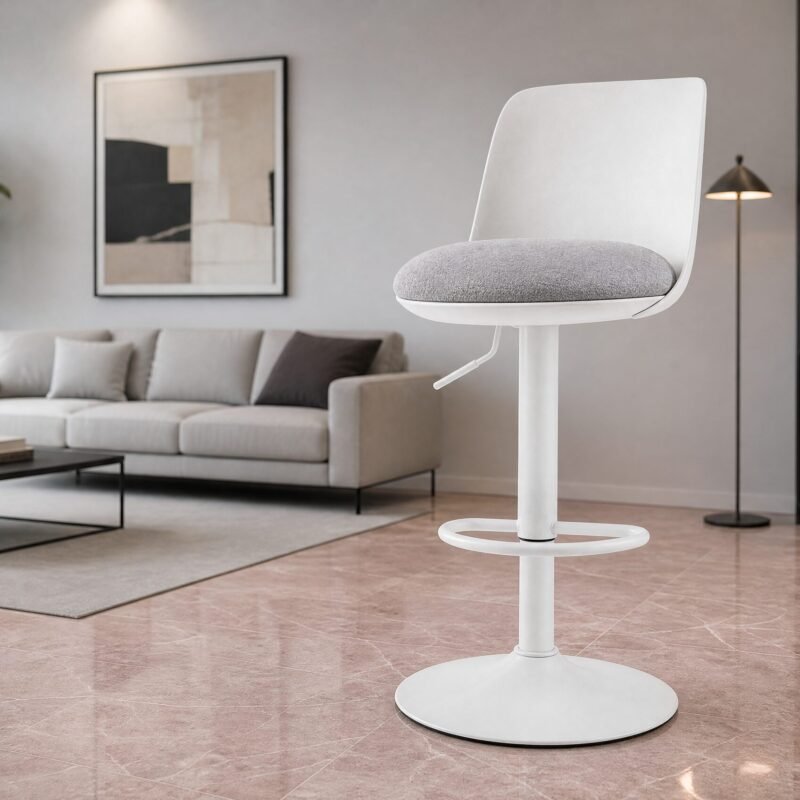 White modern bar stool with gray cushioned seat in a contemporary living room.