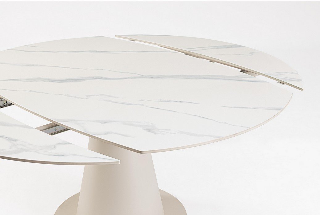 TAV ALJAMI 160X102-160 CREMA-STATUARIO6 - JOLLYGIUNCO Round white marble-top dining table with integrated butterfly leaves extended on the sides, minimalist pedestal base.