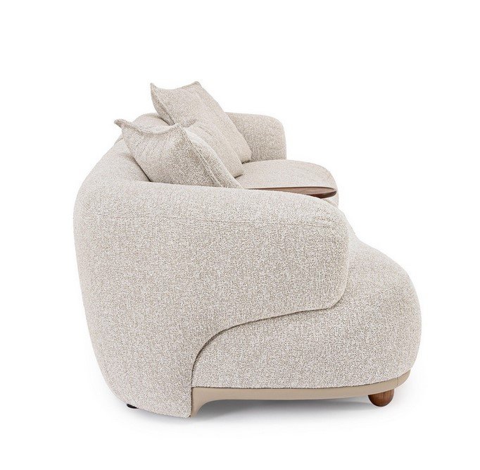 DIVANO 4P C-C CHEOPE3 - JOLLYGIUNCO Beige boucle upholstered lounge chair with curved arms and two matching throw pillows, shown from the side.