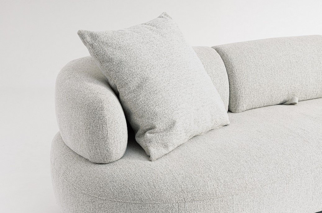 DIVANO C-C AFRODITE9 - JOLLYGIUNCO Light gray textured fabric sofa with rounded armrest and two matching cushions.