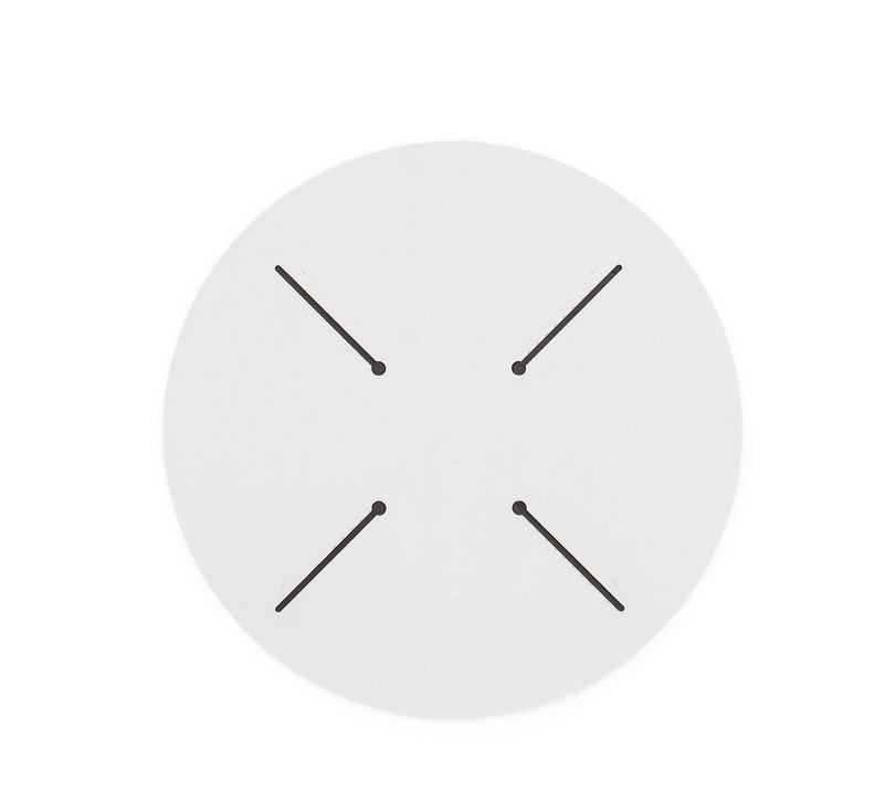 PIANO TAVOLO D70 HPL ARABESCATO1 - JOLLYGIUNCO White circular disk with four short black diagonal lines radiating from the center toward the edge, resembling a minimal clock face or abstract symbol.