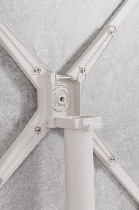 TAVOLO BAR ALTO CLARET 70X703 - JOLLYGIUNCO Close-up of a white adjustable mounting arm with four hinged arms forming an X around a central hub on a vertical pole.